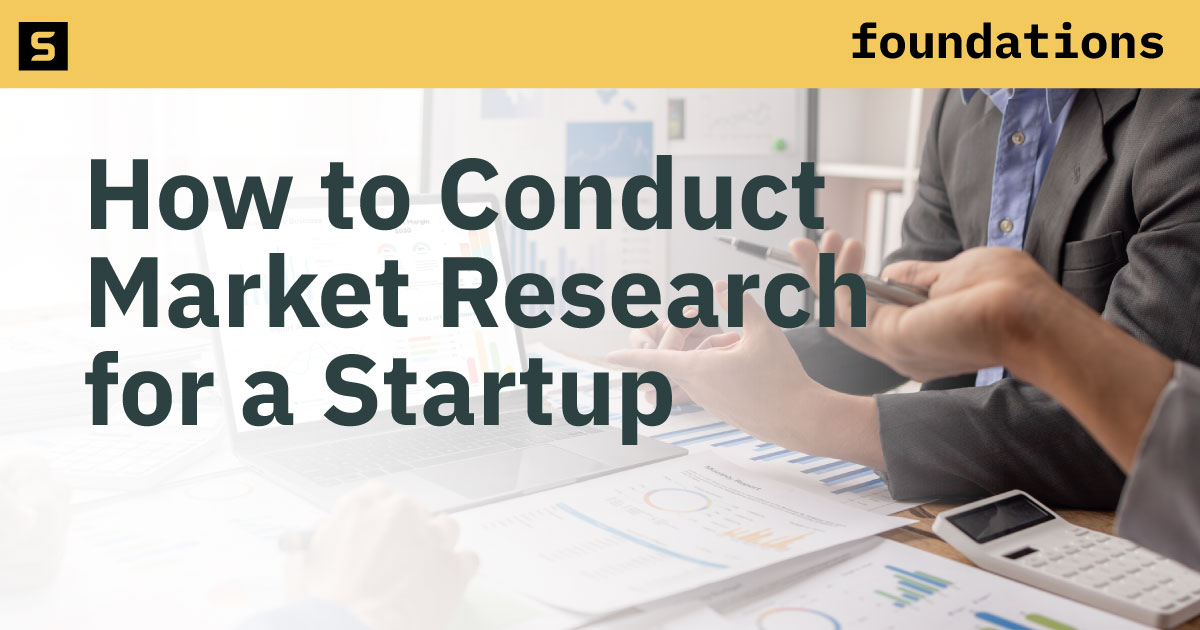Two people looking at market research.