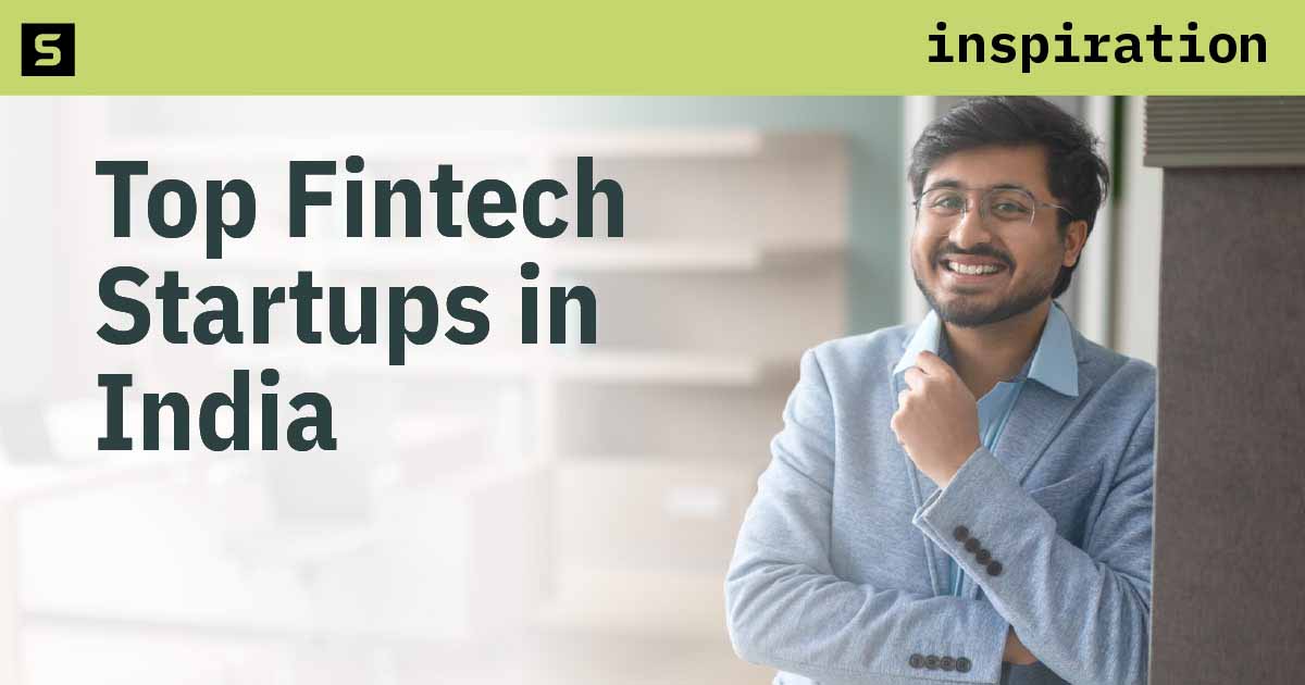 Man in India looking at the top fintech startups on a tablet.
